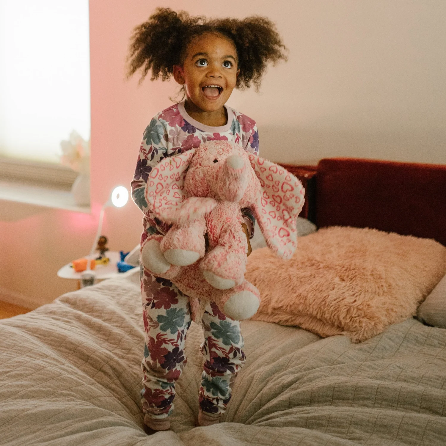 A child enjoying a comfortably furnished room